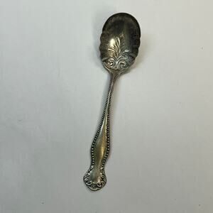 Ornate silver plate sugar shell spoon w in diamond hallmark vintage 6 inch